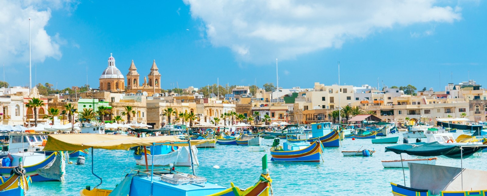 Traditional fishing boats in Marsaxlokk Harbour, Malta